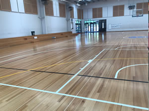 Cleaning school basketball court